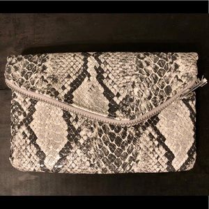 Francesca’s snakeskin clutch
